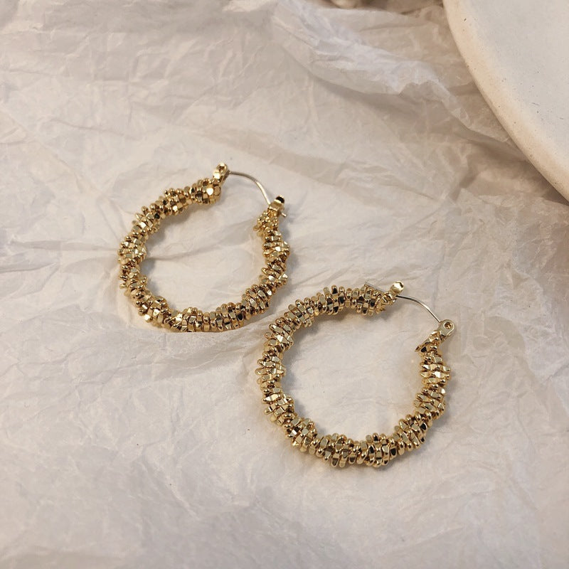 Boucles d'oreilles Bundy torsadées - L'Éclat minimaliste