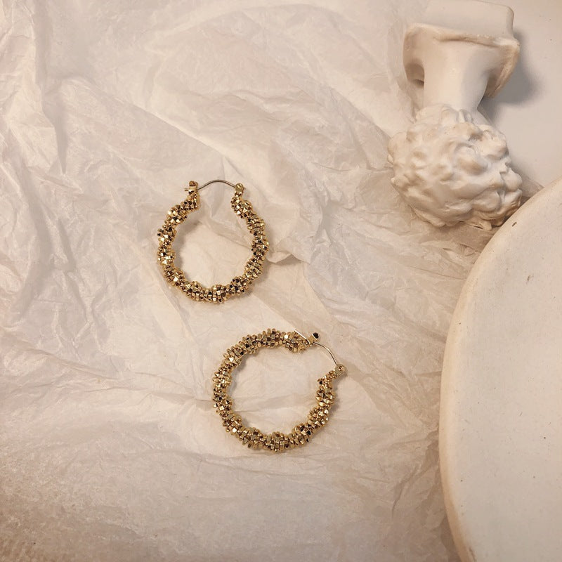 Boucles d'oreilles Bundy torsadées - L'Éclat minimaliste