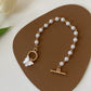 Bracelet Papillon et perles – Douceur féérique